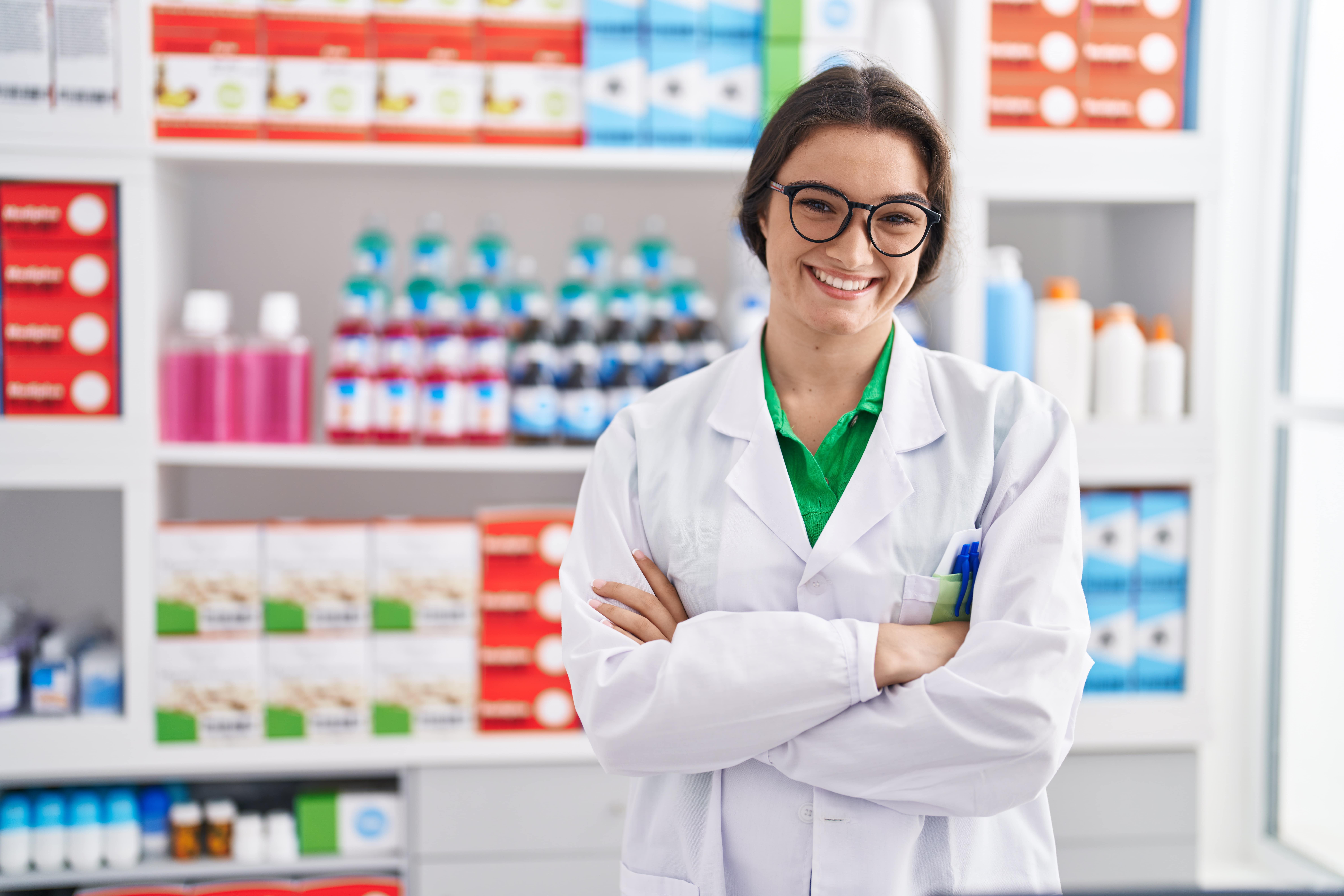 Friendly pharmacist preparing your prescription